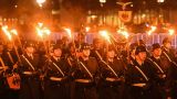 «Повторно травмируют мир»: немцы шокированы факельным шествием бундесвера у Рейхстага